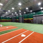 Machine batting cages in baseball facility