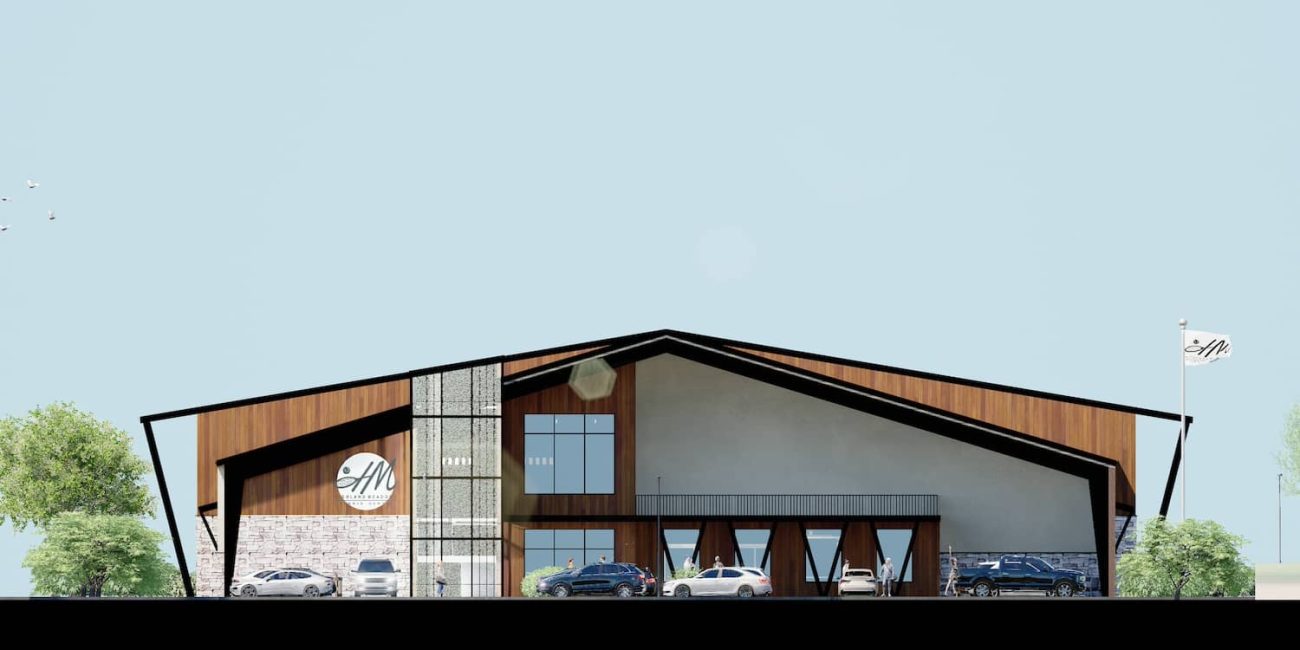 Main entrance elevation rendering featuring central glass tower and angular rooflines